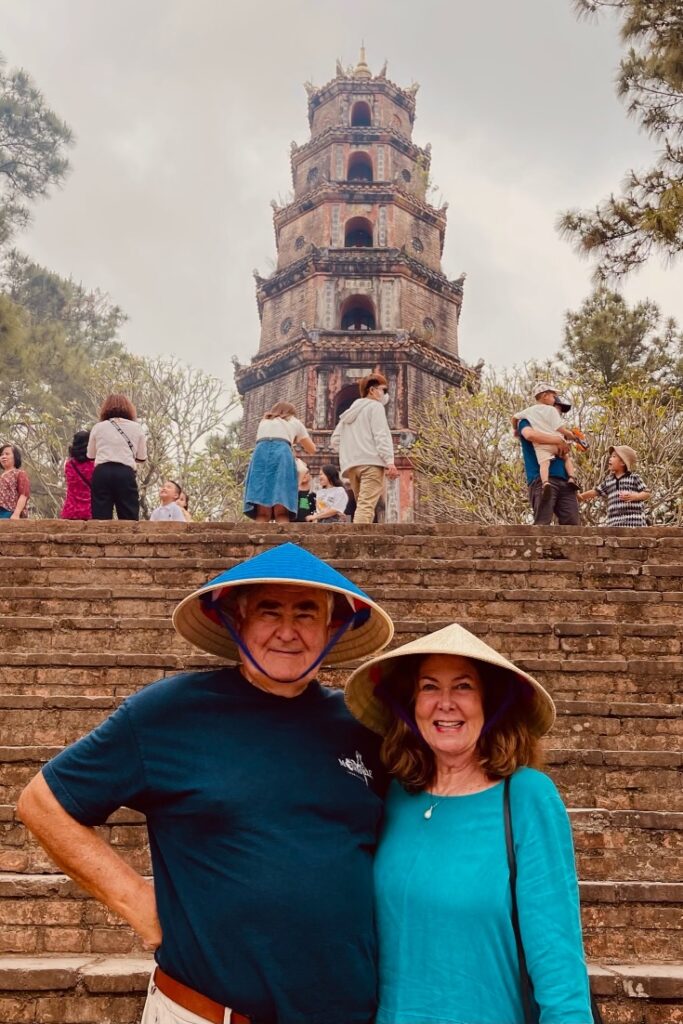 Americans Can Travel to Vietnam -Hue  Cos and Robin in front of the Pagoda