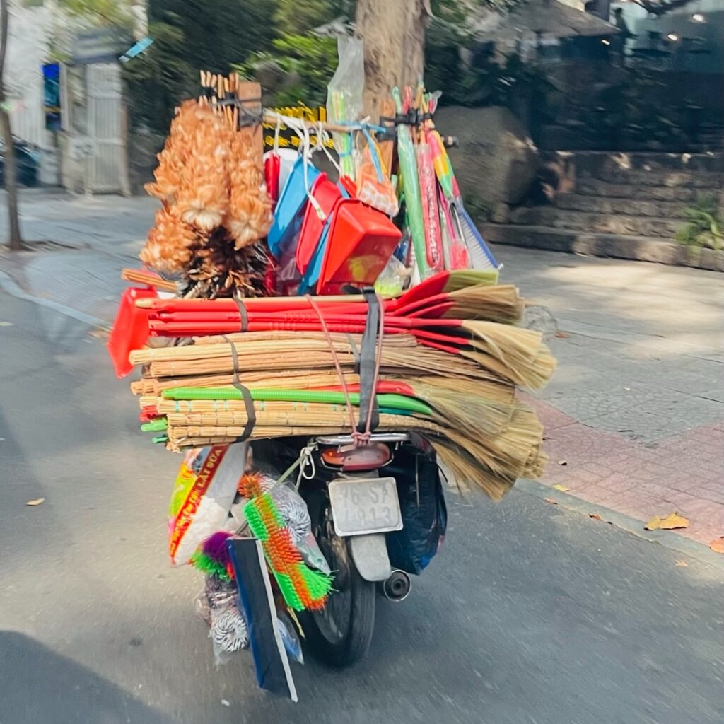 Best time to visit vietnam - scooter with things..