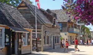 Historic St. Augustine old town street with wooden buildings.