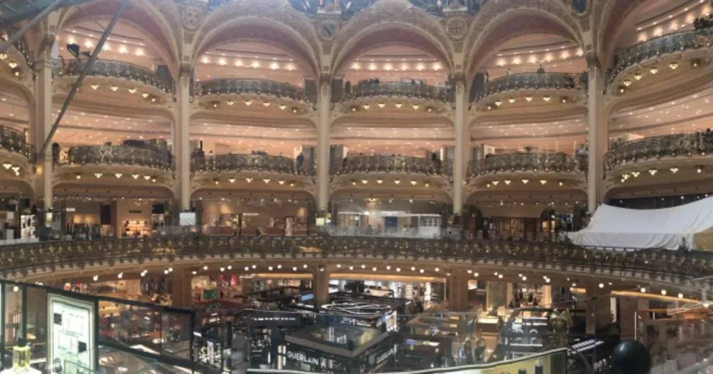 Interior view of elegant multi-story shopping mall.
