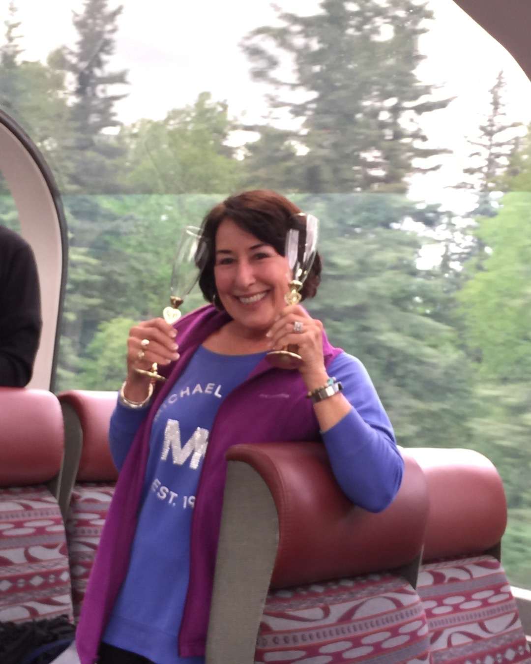 Visiting Fairbanks Alaska in July: Nancy with champagne on the train