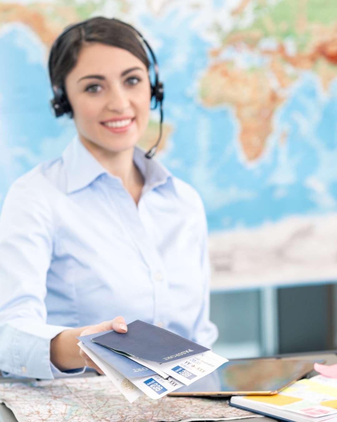 "Travel Agent vs Do It Yourself Travel" Picture of a travel agent