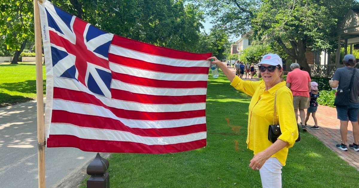 Robin Holding the Williamsburg Flag