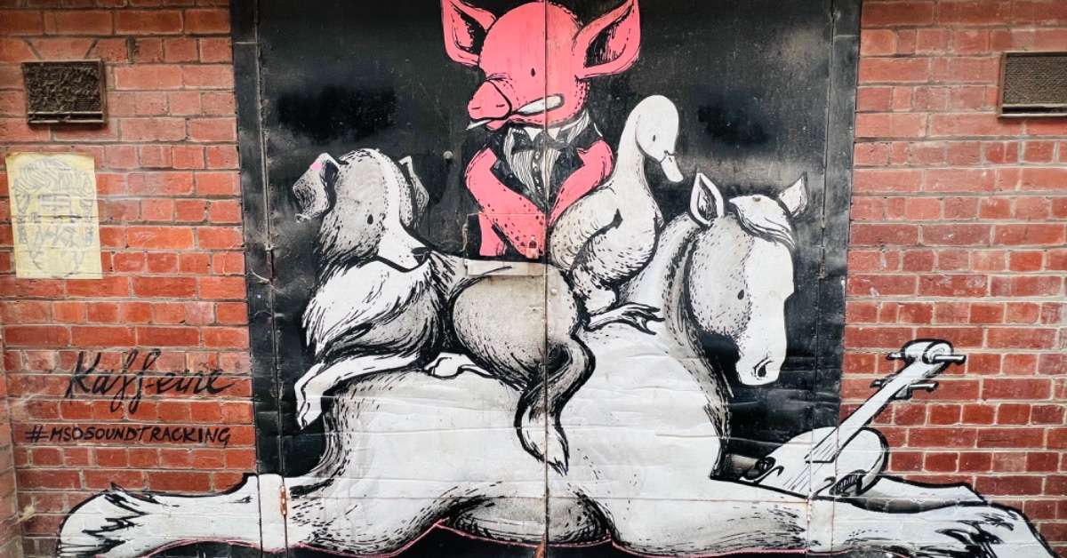 Graffiti picture of pigs, horse and dog