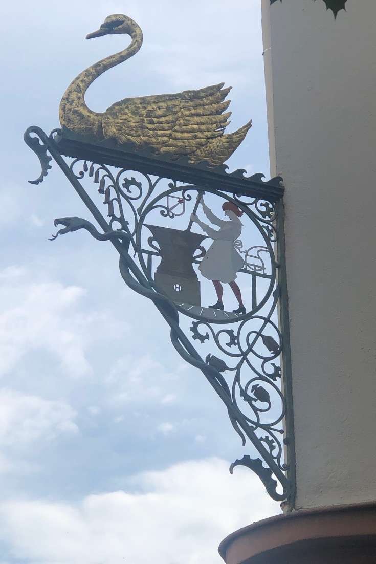 Planning a trip to France - Colmar sign with swan