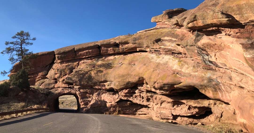 7-day Itinerary Utah national Park: Road leading to natural rock opening for cars to pass