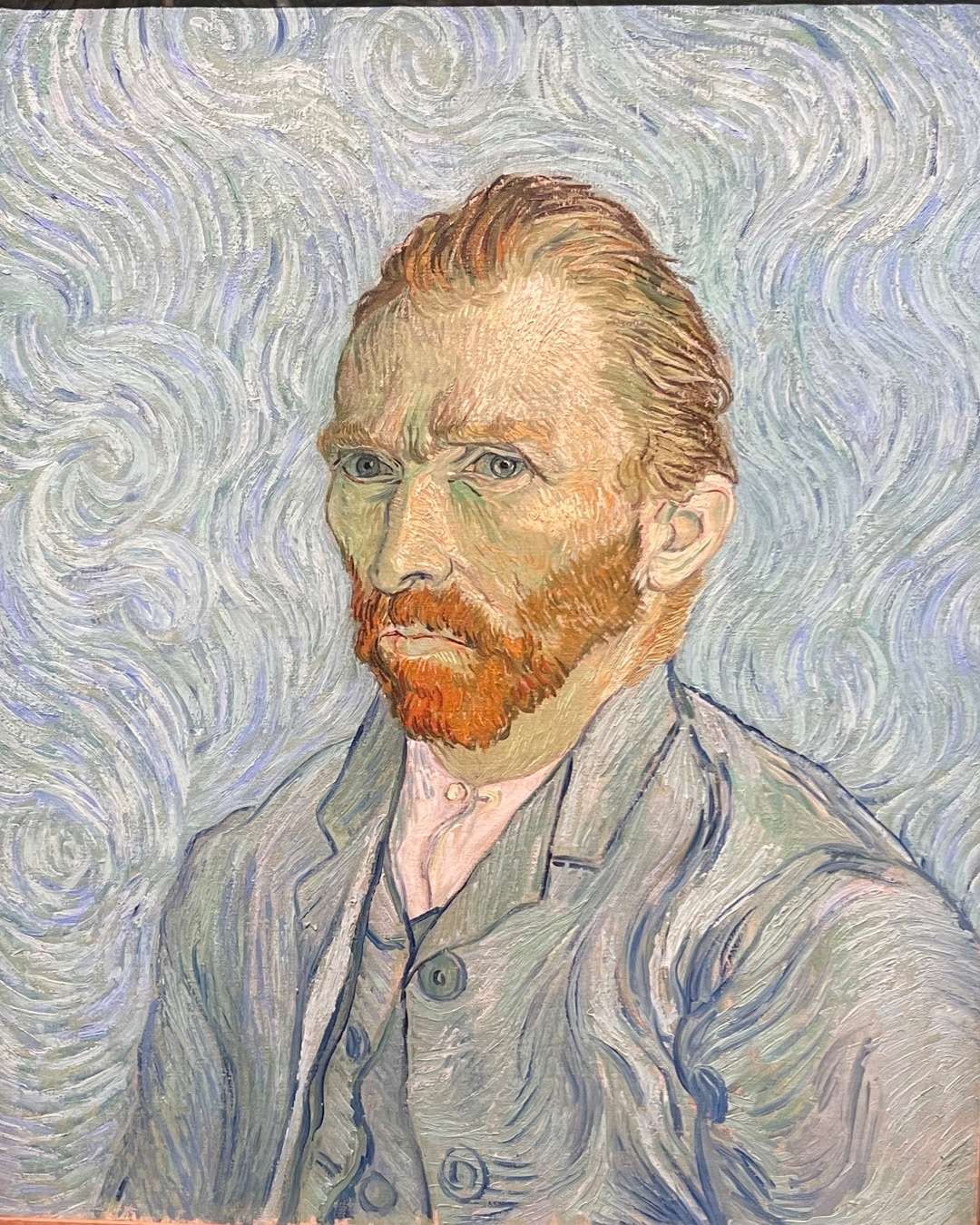 Self Portrait of Van Gogh with a red beard and hair, with swirling blue and white background