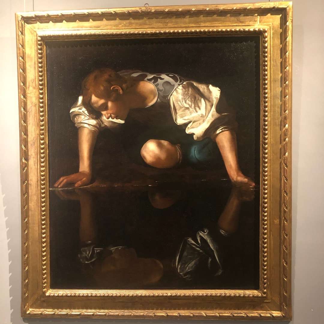 Painting with dark background of a young man, kneeling as he looks into the water at Barberini Plaza