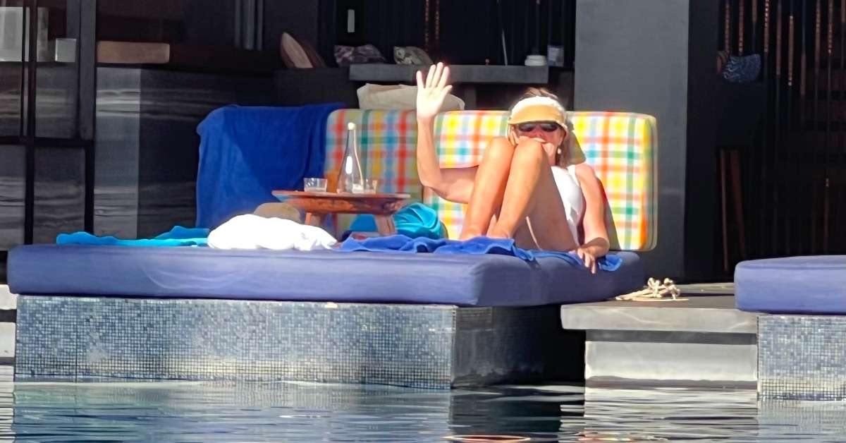 Where to stay in Bali: Hotel Indigo, Robin at the pool waving to Cos at the Beach