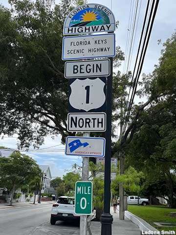 Signs showing Milepost 0 on Route 1 North in Key West