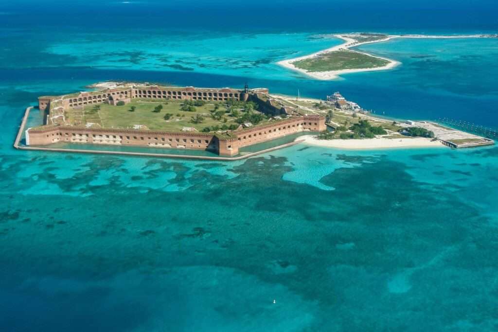Aerial view of the fort at Dry Tortugas showing both its isolation and its tropical colored waters surrounding it