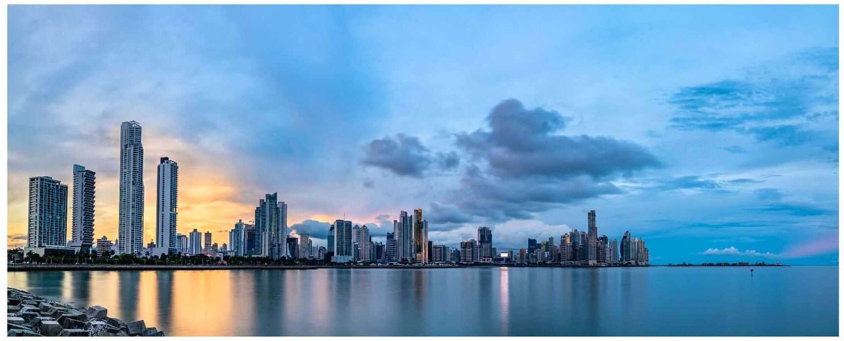 Skyscrapers silouetted against clouds and sunset at Panama City