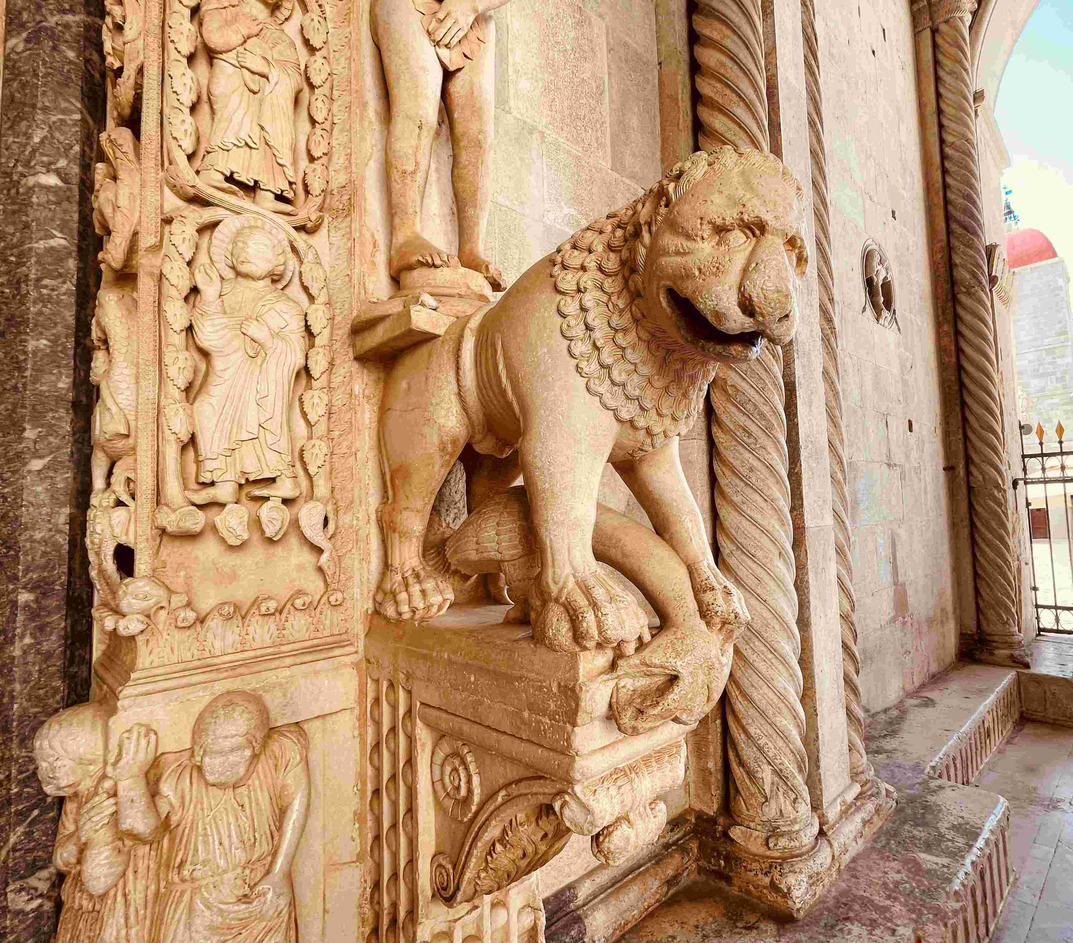 Carved lion at the entrance of the Cathedral of St. Lawrence in Trogir, Croatia