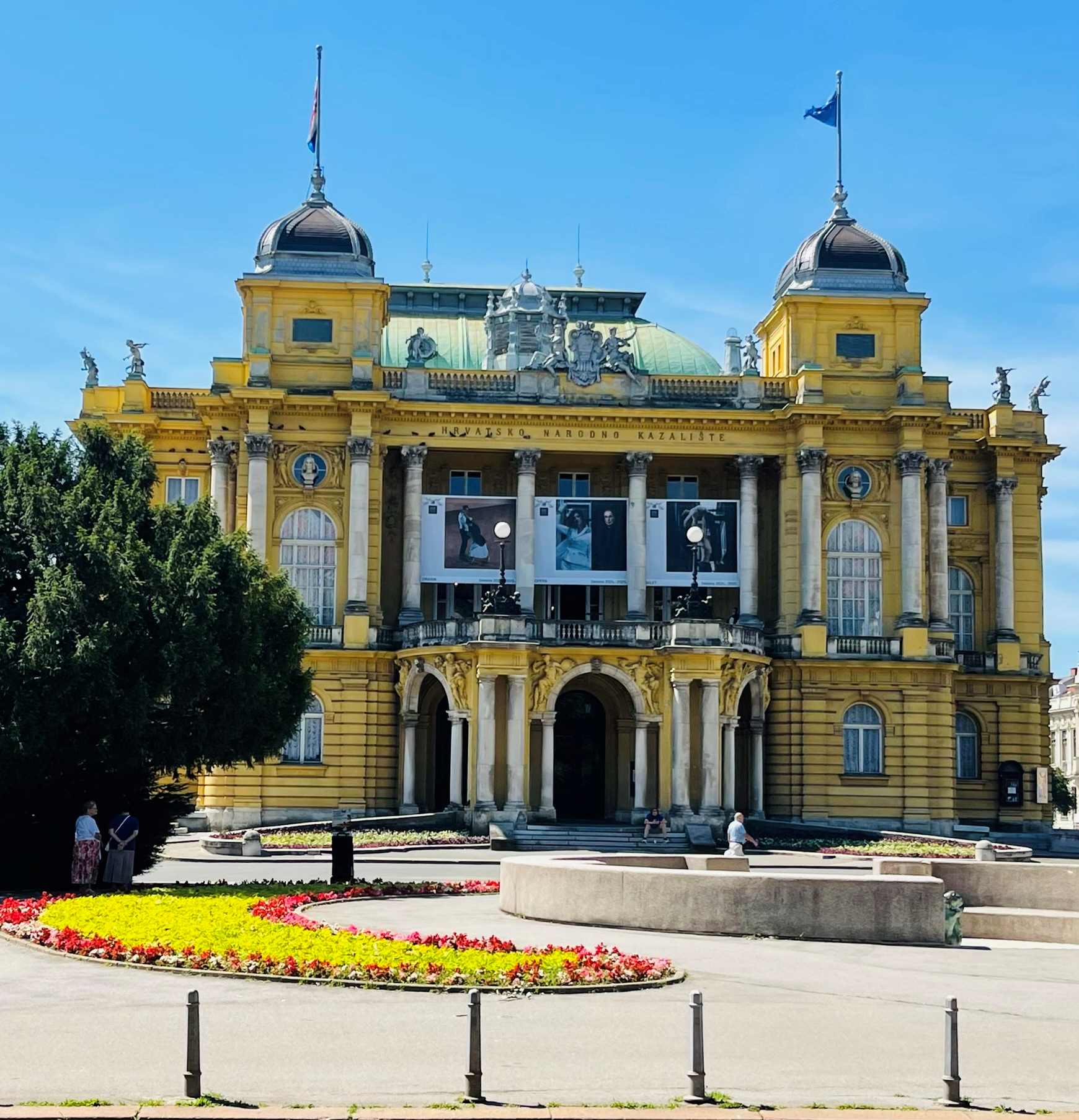 Ornate yellow National Theatre Building in Zagreb, Croatia