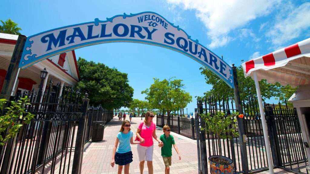 Family exploring the shops and restaurants in Mallory Square, an historic district in Key West Attractions for couples
