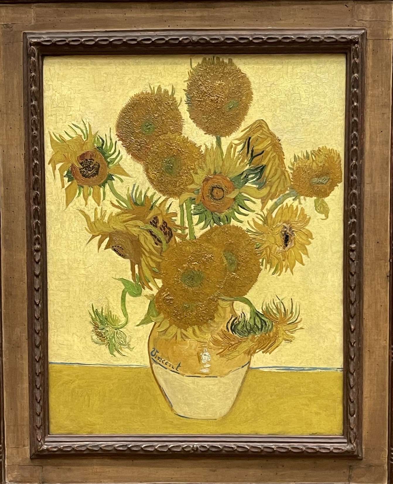 Painting of sunflowers in a vase with Vincent on vase in Albert and Victoria Museum in London