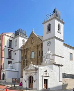 Brilliant white Metropolitan Cathedral in Casco Viejo sits prominently on a hilly street