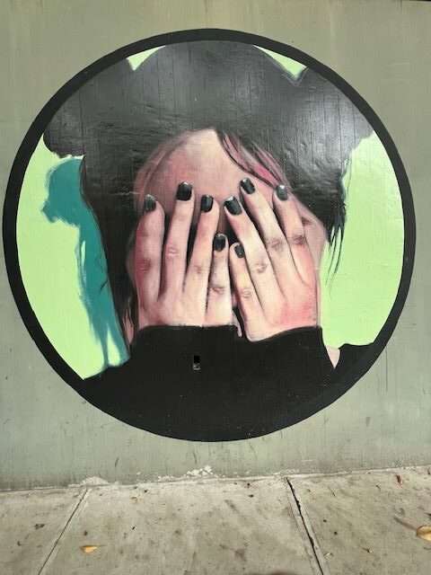 Buenos Aires in winter: Girl Hiding her Face