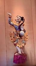 Traditional ornate Asian dancing sculpture