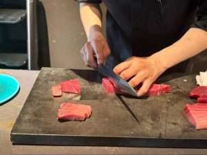 tuna getting sliced; ; Is Tokyo Expensive to visit? No