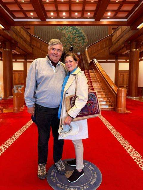 Visiting places in Seoul South Korea: Cos and Robin standing in front of the main staircase