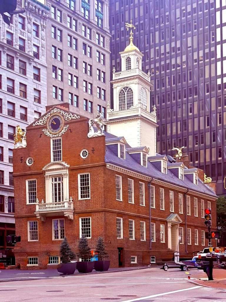 Historic building in downtown Boston with clock tower.