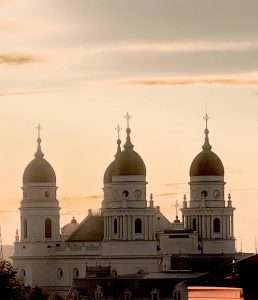 Historic cathedral domes at sunset