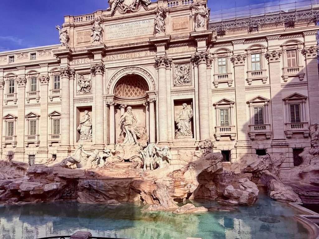How many days do you need in Rome? Trevi Fountain in Rome, sunny day view, a mus