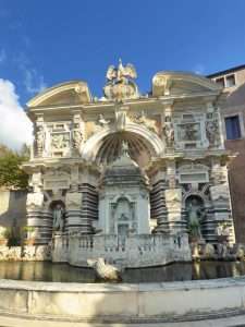 Private Excursions from Rome: Baroque architectural fountain with sculptures and ornate details.