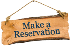 Wooden sign with 'Make a Reservation' text