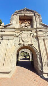 Historic stone archway with intricate carvings.