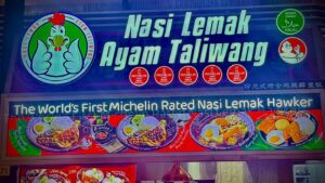 Michelin-rated Nasi Lemak Ayam Taliwang restaurant sign.