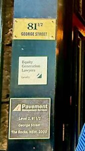Office signs for George Street addresses.