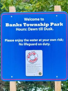 Banks Township Park sign, open dawn till dusk.