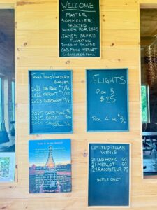 Wine menu with prices and flight options.