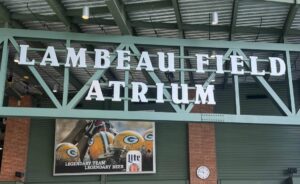 Lambeau Field Atrium entrance with Miller Lite sign.